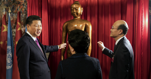 中國國家主席習(xí)近平與世衛(wèi)組織總干事陳馮富珍為針灸銅像揭幕